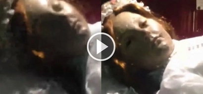 Spine-chilling moment a child saint that was dead for 300 years opens her eyes