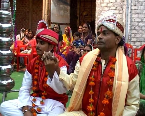 What is the world coming to?! 2 straight men get married in front of their wives to make rain fall What is the world coming to?! 2 straight men get married in front of their wives to make rain fall