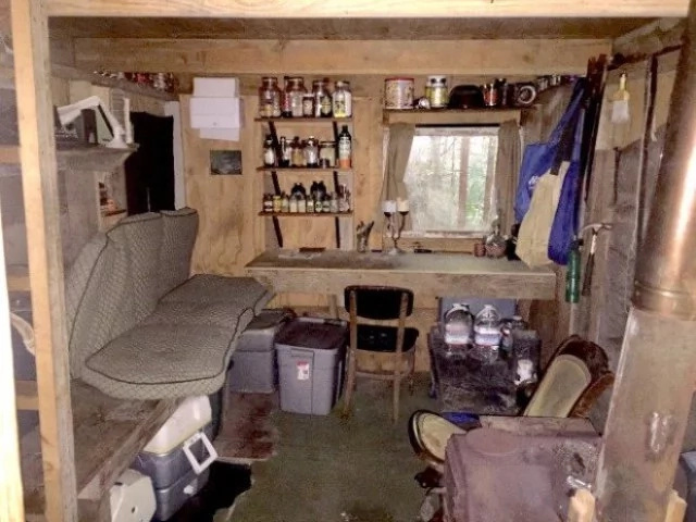 A squatter builds a remarkable shelter in a forest but evades all human contact A squatter builds a remarkable shelter in a forest but evades all human contact