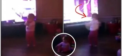 A little girl was standing in her family room, playing peek-a-boo with parents. Suddenly, some mysterious force attacked her & she lost her balance..
