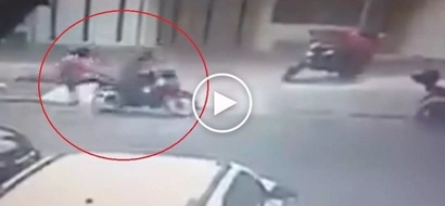 Heroic man throws awesome flying kick to rescue woman from dangerous kidnapper