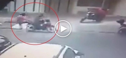 Heroic man throws awesome flying kick to rescue woman from dangerous kidnapper