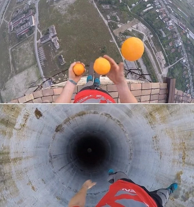 Man with deathwish rides UNICYCLE and perform tricks on 250m chimney Man with deathwish rides UNICYCLE and perform tricks on 250m chimney