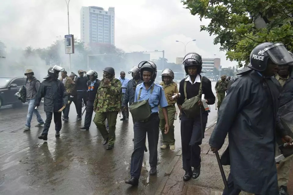 Hundreds brave the rain in a CORD march to the IEBC offices