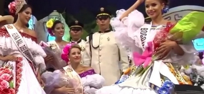 Awkward! Runner-up snatches crown from pageant winner!