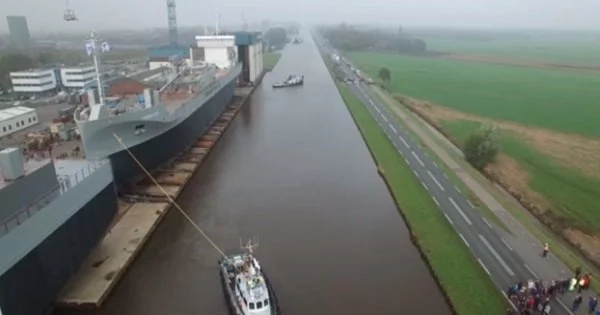 A New Launch Ship Created An Enormous Splashed As Two Small Boats Brought It Into The Water. Watch The Full Video Of How It Happened. A New Launch Ship Created An Enormous Splashed As Two Small Boats Brought It Into The Water. Watch The Full Video Of How It Happened.