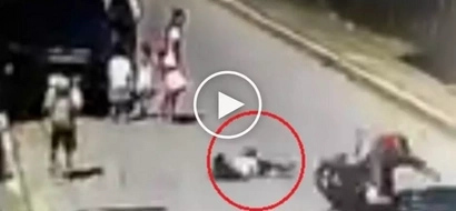 Careless Pinoy child gets brutally ran over by motorcycle while crossing street in Cavite