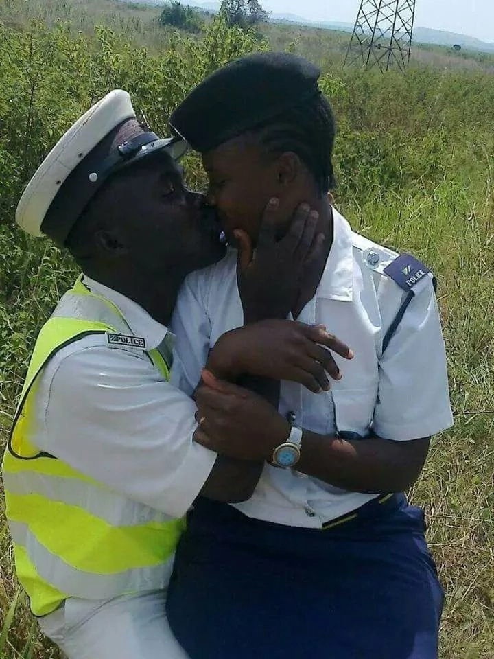 A photo of police officers kissing in he bush lights up the internet