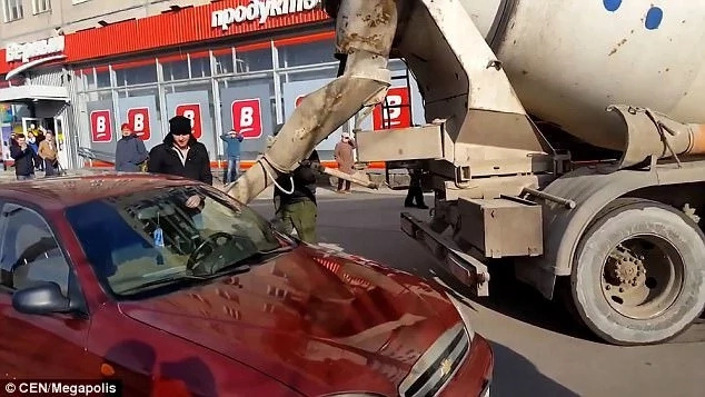 Angry husband fills wife's car with CEMENT after she changed her surname to promote her store (photos, video) Angry husband fills wife's car with CEMENT after she changed her surname to promote her store (photos, video)