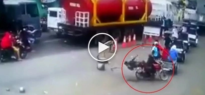 Pinoy motorcycle passenger suffers embarrassing accident after rider breaks traffic rule