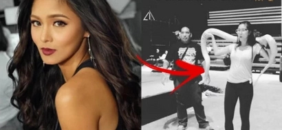Ang tapang ni ate! Kim Chiu gamely holds a live snake for an upcoming ASAP production