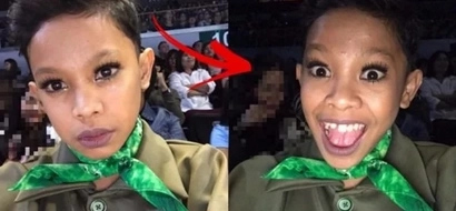 Ang kulit lang! KC Concepcion wins photobomber of the year by sneakily posing with Awra Briguela's selfies