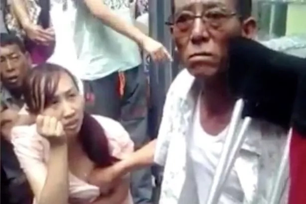 Chinese mystic can tell the future by touching women's breasts Chinese mystic can tell the future by touching women's breasts