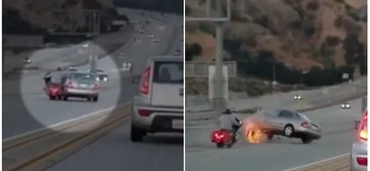 Biker aggressed car driver while driving. His move caused such a tragedy that traffic had to stop