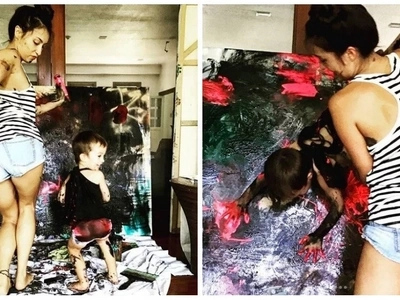 Fun tita she is! Solenn Heussaff bonds with her nephew as they paint her art pieces together
