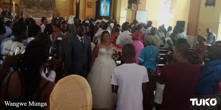 Kenyan man marries Indian girlfriend in rare church wedding and the photos are lit AF