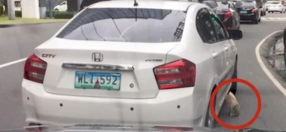 Disgusted netizen shares awful Filipino throwing out trash on the road