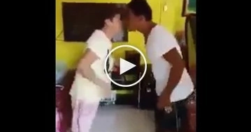 Husband and wife plays "Pak Ganern" game and seals it with kisses