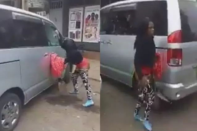 Half-dressed Nairobi woman loses it, smashes clients car in broad day light (photos)