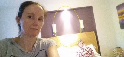 Mom captures dying daughter's 'guardian angel' when she took their photo during her final days