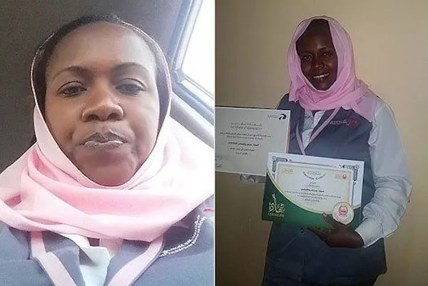 Peris posing with her certificates