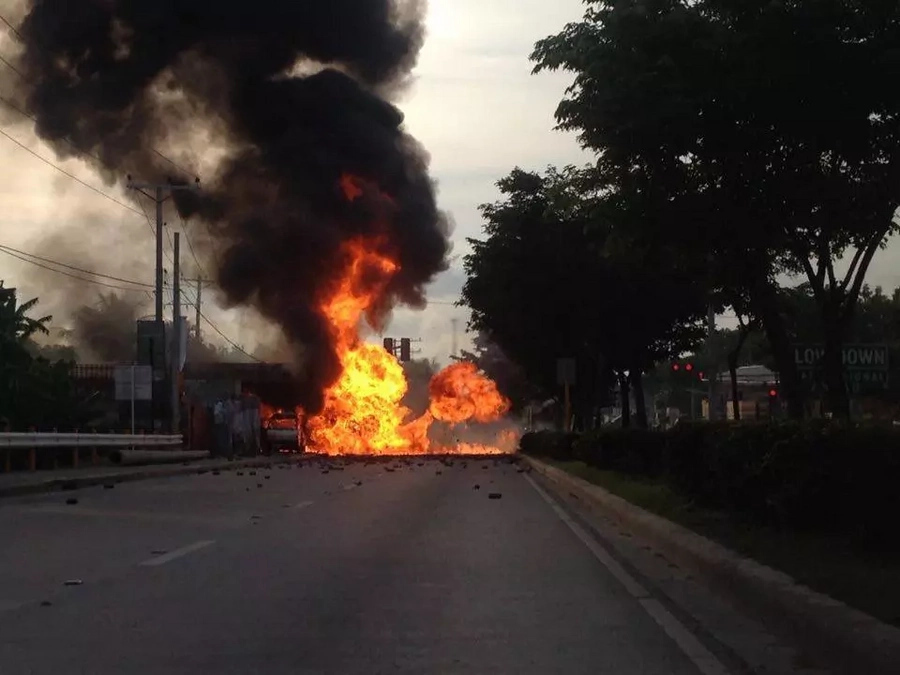 School bus collides with truck carrying butane, explodes School bus collides with truck carrying butane, explodes