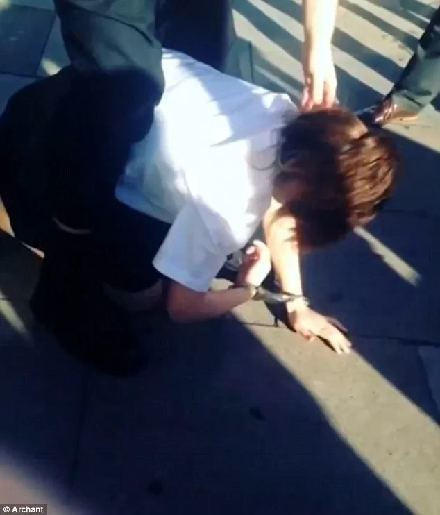 Police officer is caught on camera dragging 13-year-old girl by her hair Police officer is caught on camera dragging 13-year-old girl by her hair