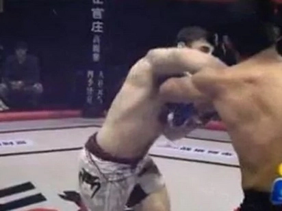 MMA Fighter Cheap Shots His Opponent With A Fake Glove Touch