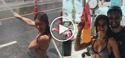 Coleen Garcia and Billy Crawford splash buckets of water at strangers in Thailand