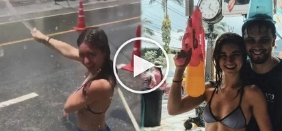 Coleen Garcia and Billy Crawford splash buckets of water at strangers in Thailand