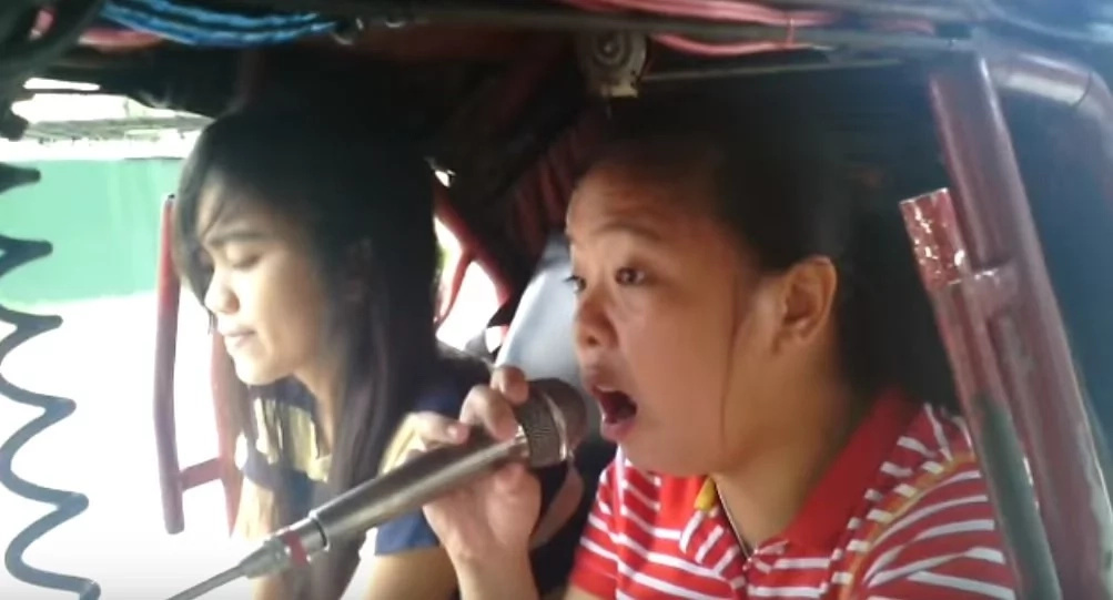 Viral video features powerful voice of Pinay tricycle passenger Viral video features powerful voice of Pinay tricycle passenger
