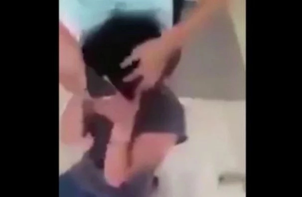 A mom shaves her screaming daughter's head for making fun of a cancer patient A mom shaves her screaming daughter's head for making fun of a cancer patient