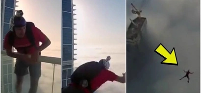 Daredevil jumping through the fog of 200m skyscraper will scare you to death