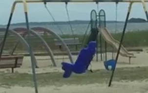 WATCH: Dad films creepy video of a ghost playing on the swing