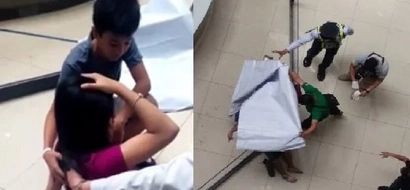 Chilling situation when a mallgoer jumps off the 4th floor and fell on a woman caught on cam